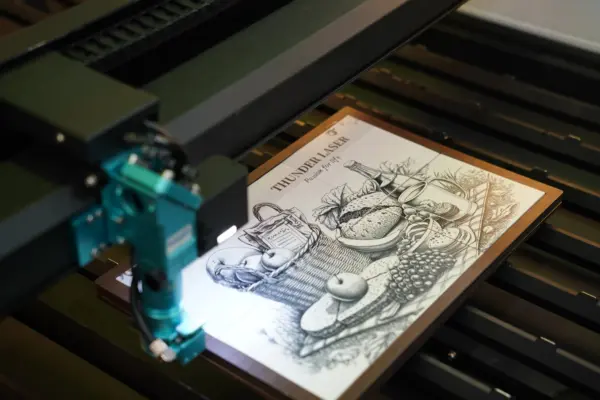 1779158708853414.png Titan-63-100W-RF-Tube-CO ₂-laser-machine-is-engraving-a-high-resolution-photo-600x400.png